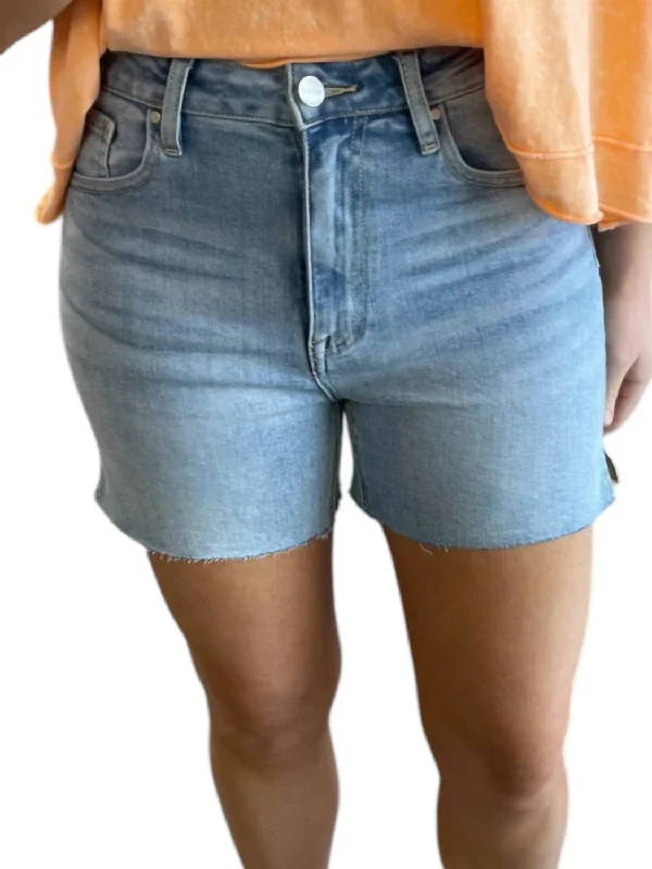 Your Timeless Wardrobe Awaits High Rise Raw Cut Denim Shorts In Light Wash