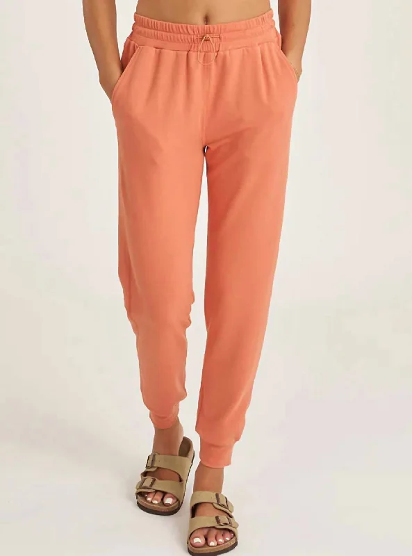 Versatile Wardrobe Essentials Comforted Bungee Waist Jogger Pants In Ochre Orange